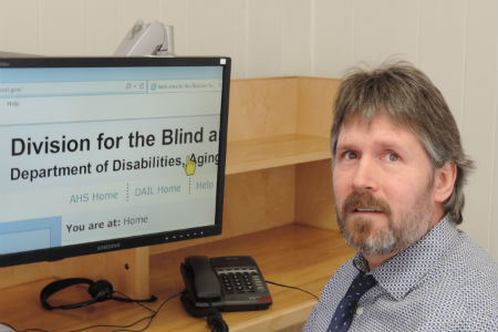 Fred Jones, the Director of the Vermont Division of the Fred Jones is the Director of the Division of theBlind and Visually Impaired.  Fred is blind and uses assistive technology in his job.